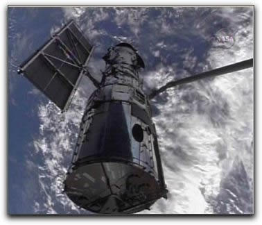 Hubble held robotic arm